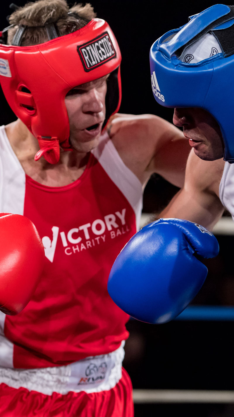 two boxers compete