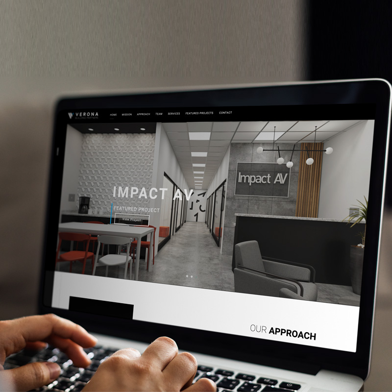 a laptop is shown displaying the Verona building partners website